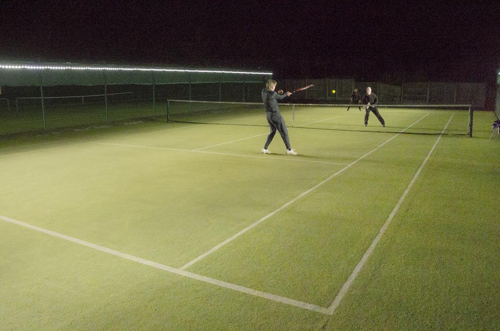 Tweener tennis court lighting for a leading London club